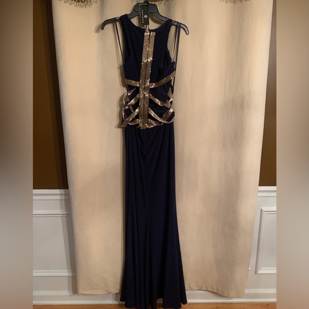NWT PROM. Navy Faviana NWT gown with sequin cut outs
